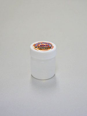 A white container sitting on top of a table.