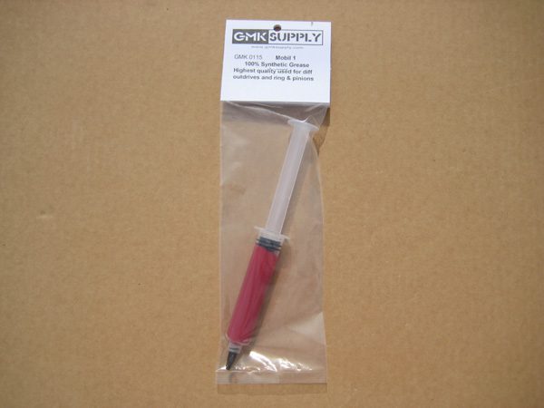 A red and white pen in its plastic packaging.