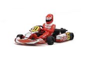 A man in red racing suit sitting on a go kart.