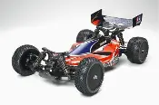 A red and black remote controlled car with a wing on the side.