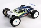 A close up of an rc car on the floor