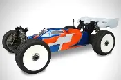 A remote controlled car with an orange and blue design.