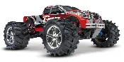 A red and black monster truck with large tires.