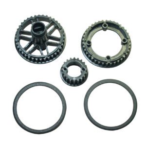 Plastic gears and rings on white background.